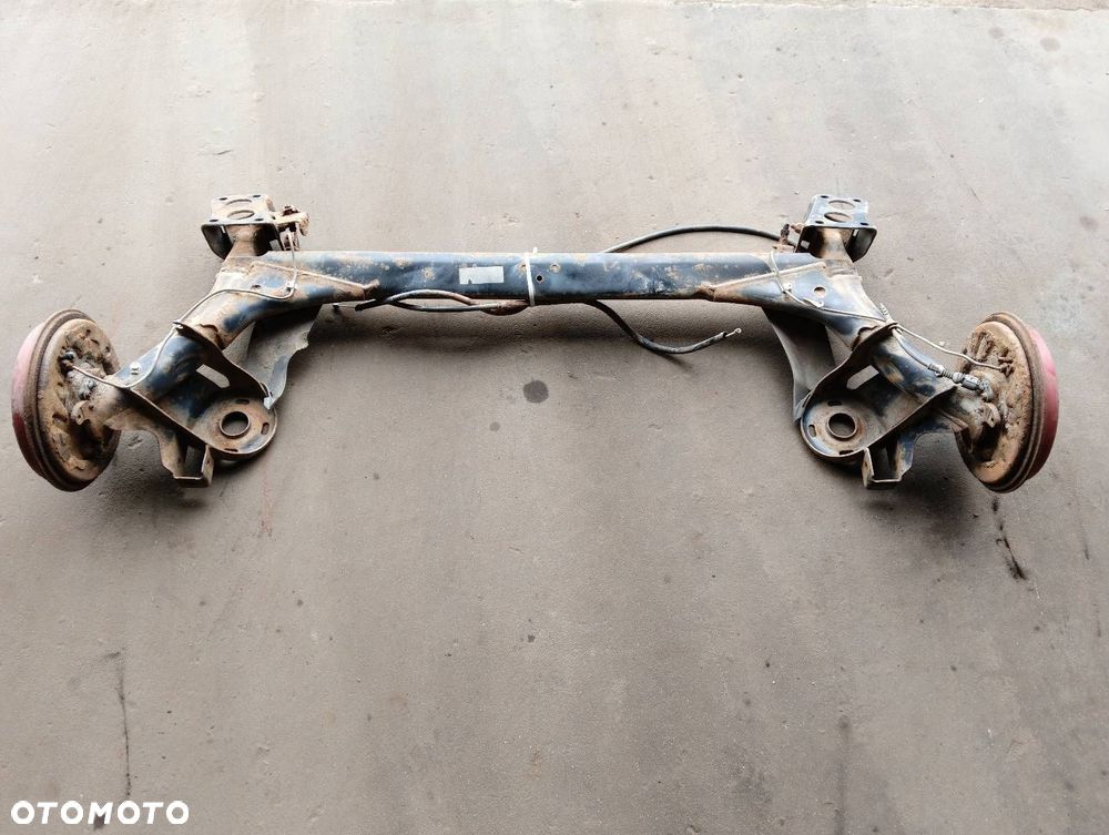 BELKA OŚ ZAWIESZENIA TYŁ BĘBNY Z ABS SKODA OCTAVIA I HB 5D - 1