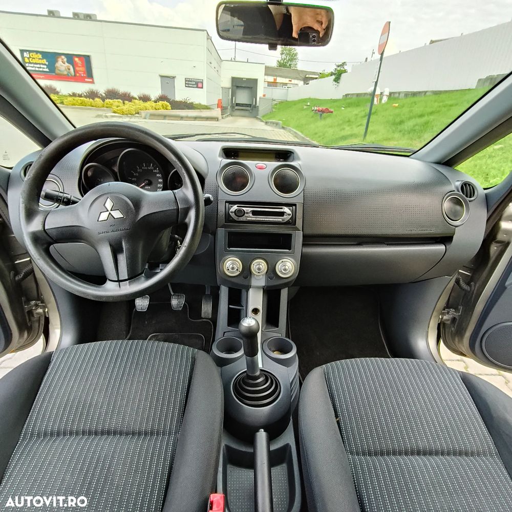 Mitsubishi Colt 1.1 Inform + - 5