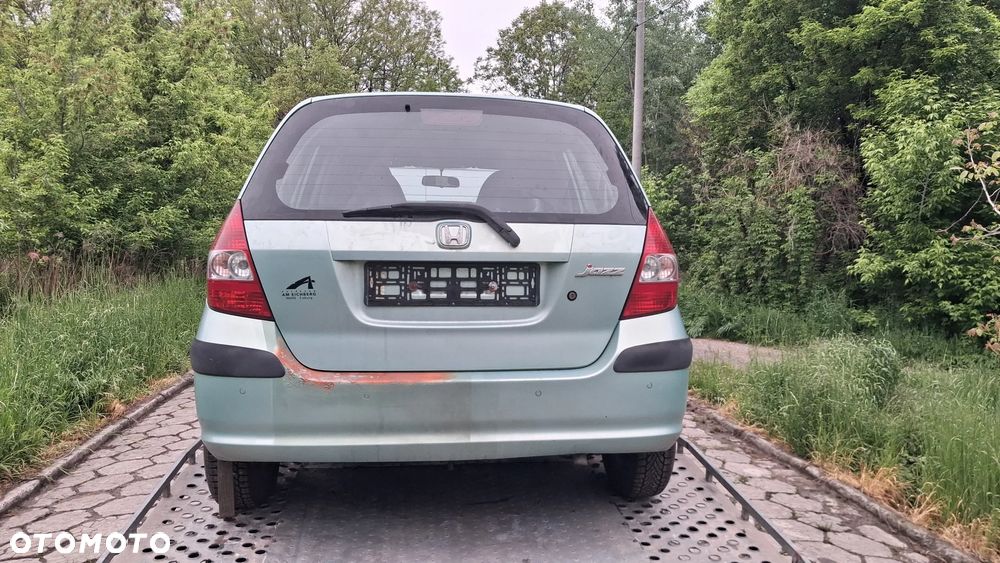 Na części Honda Jazz II Silnik 1.3 83KM L13A1 lakier G506M skrzynia automatyczna CVT maska zderzak drzwi klapa szyba fotel kanapa lusterko lampa deska GWARANCJA !!! Przód Tył Zestaw Komplet Drzwi Klapa Zderzak Błotnik Maska Grill Atrapa Szyba Pas Lampa Lusterko Boczki Fotel Kanapa Kokpit Deska Rozdzielcza Przełącznik Włącznik Sterownik Przewody Wiązka Instalacja Moduł Komputer Czujnik Listwa Pompa Alternator Wtryski Głowica Rozrusznik Kompresor Sprzęgło Dwumas Silnik Skrzynia ABS Klimatyzacji Paliwa Wspomagania Kolektor Turbina Przepustnica Zawór Chłodnica Koło Hak Belka Sanki Zawieszenie Mcpherson Półoś Amortyzator Wydech Tłumik Zacisk - 5