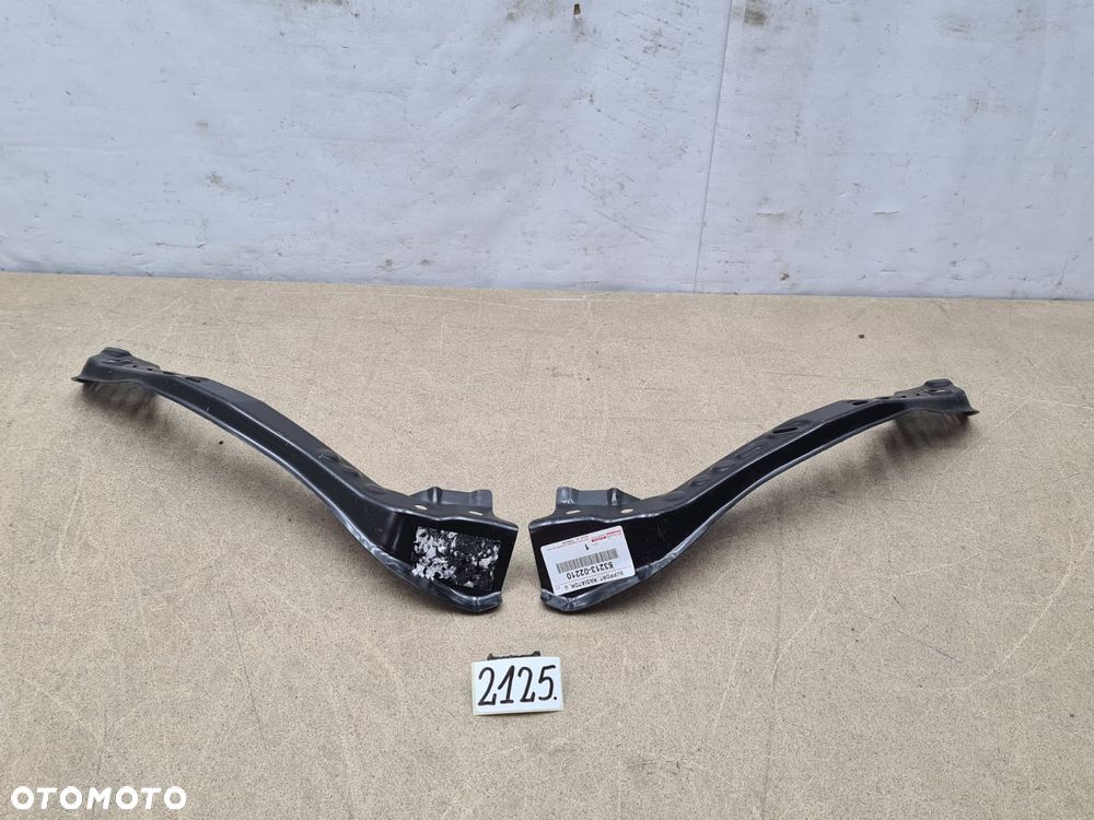 Toyota Corolla E21 53213-02210 wspornik lampy przód przedni komplet R+L - 2