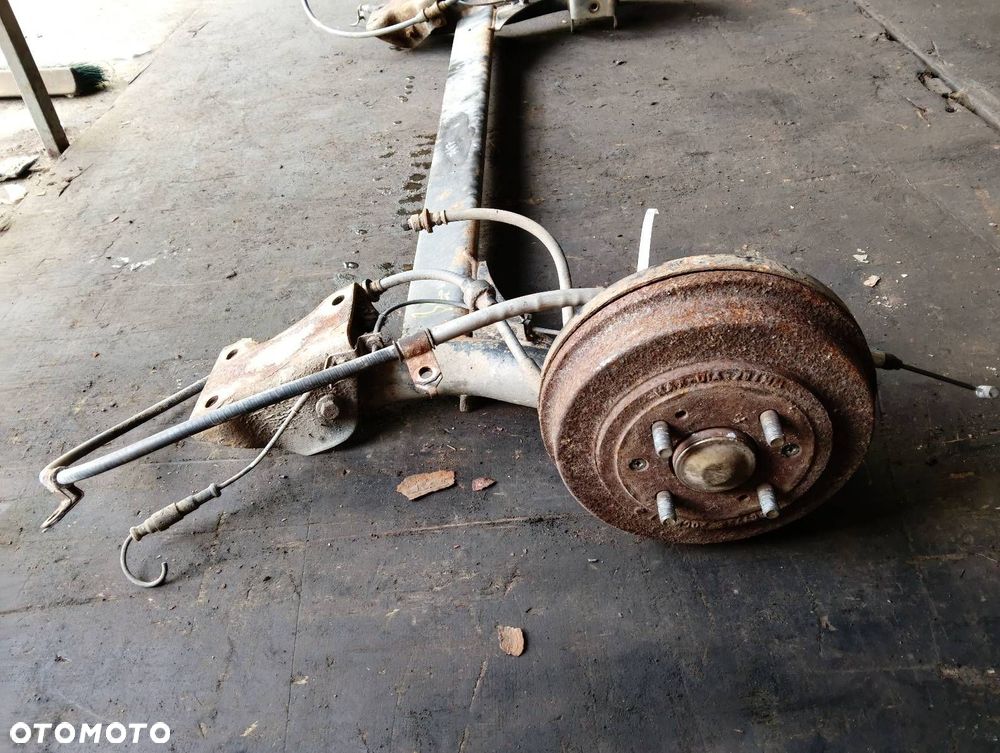 BELKA OŚ ZAWIESZENIA TYŁ BĘBNY Z ABS ROVER 200 III HB 3D - 5