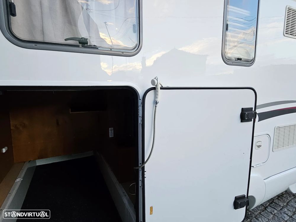 Rapido Le Randonneur 9097F CHASSI AL-KO Cama transversal + BASCULANTE - 60