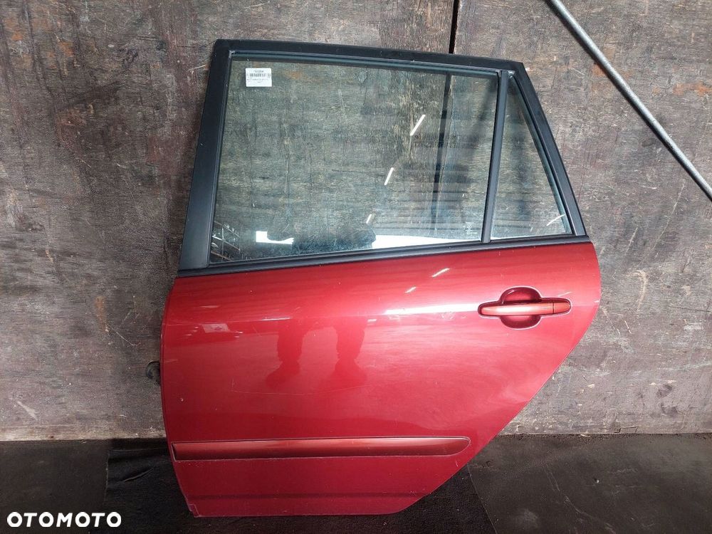 DRZWI KOMPLETNE LEWY TYŁ TOYOTA COROLLA VERSO I 3N8 - 1