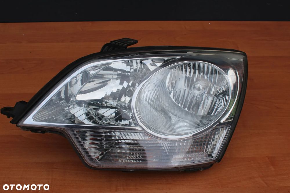 LAMPA LEWY PRZÓD PRZEDNIA LEWA OPEL ANTARA EUROPA ORYGINAŁ