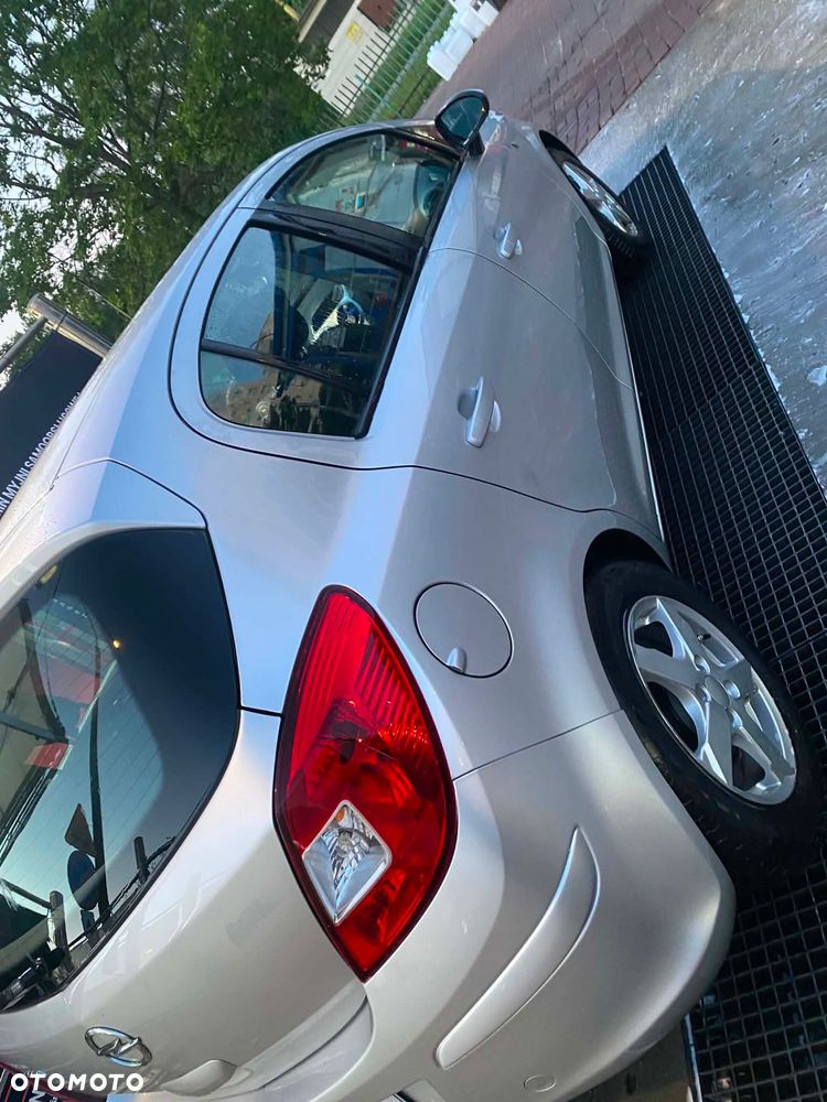 Opel Corsa 1.2 16V Enjoy - 2