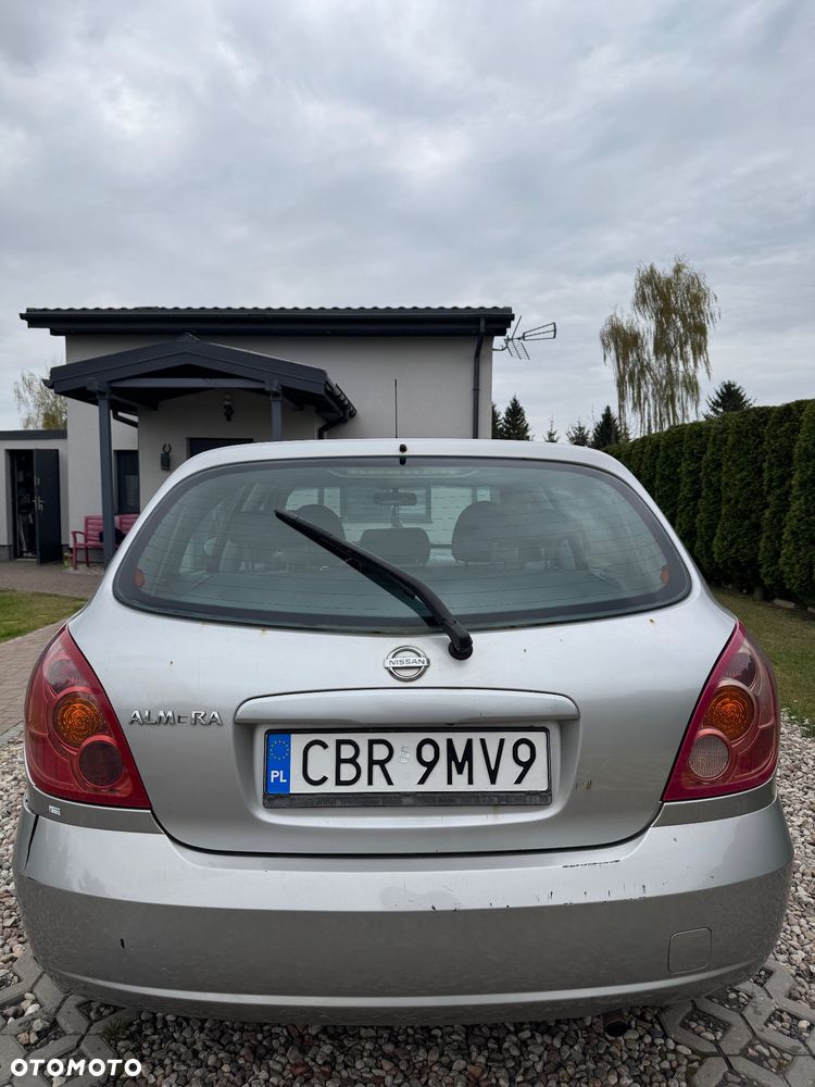 Nissan Almera 1.5 Visia + - 7