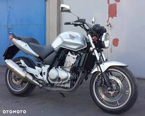 HONDA CBF 500 reflektor lampa czasza owiewka wypełnienie licznik błotnik kierownica lusterko manetka felga tarcza zacisk pompa zawieszenie silnik moduł regulator zbiornik siedzenie set podnóżek stelaż stopka chłodnica tłumik - 1