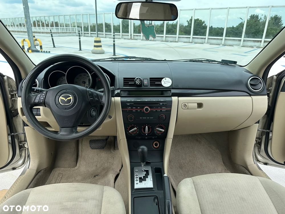 Mazda 3 2.0 Exclusive + - 12