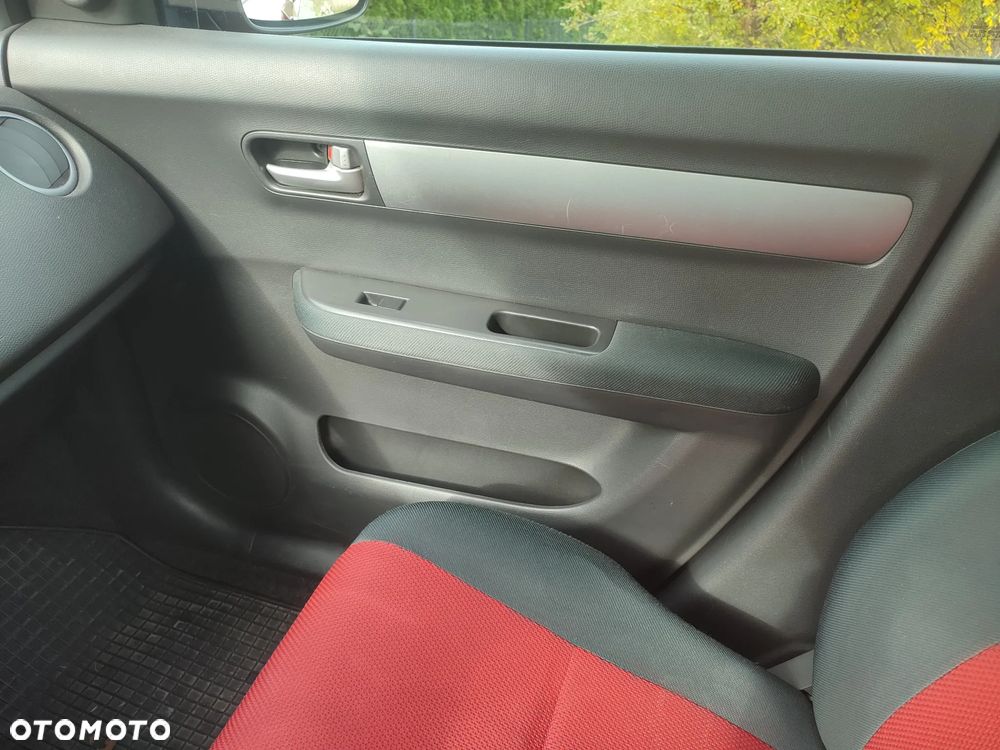 Suzuki Swift 1.3 Club - 8