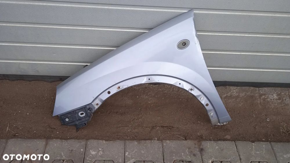 Błotnik lewy prawy przód Opel Corsa C - 2