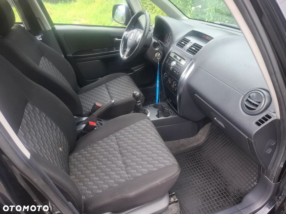 Suzuki SX4 1.6 GLX / Comfort - 23