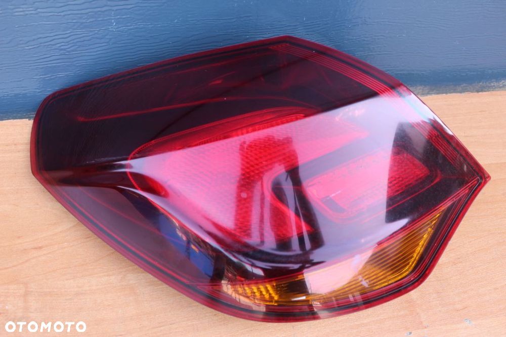LAMPA LEWY TYŁ W BŁOTNIK OPEL ASTRA J HATCHBACK PRZED LIFTEM - 2