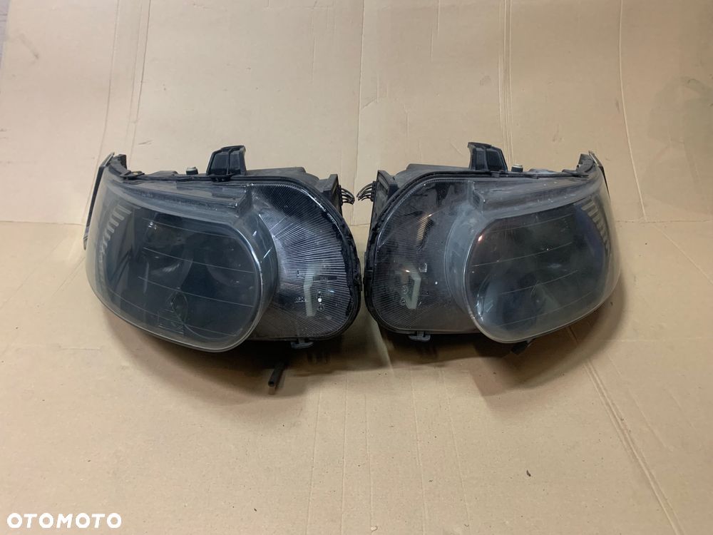 Reflektor lampa przód ksenon lewa prawa Saab 9-5 95 vector - 1