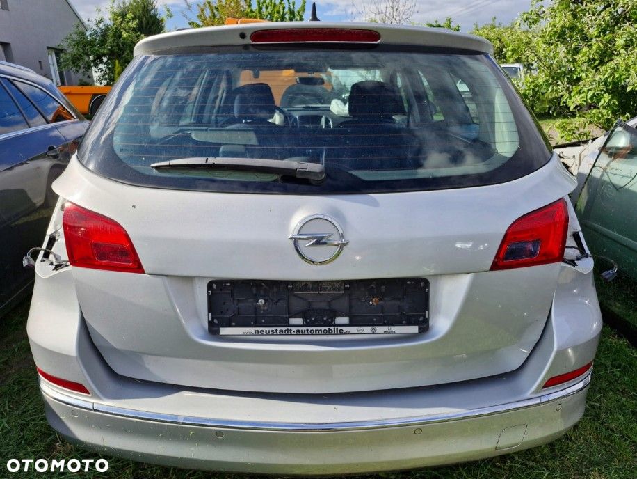 Tylna klapa bagażnika Opel Astra J IV LIFT KOMBI Z176 oryginał EUROPA