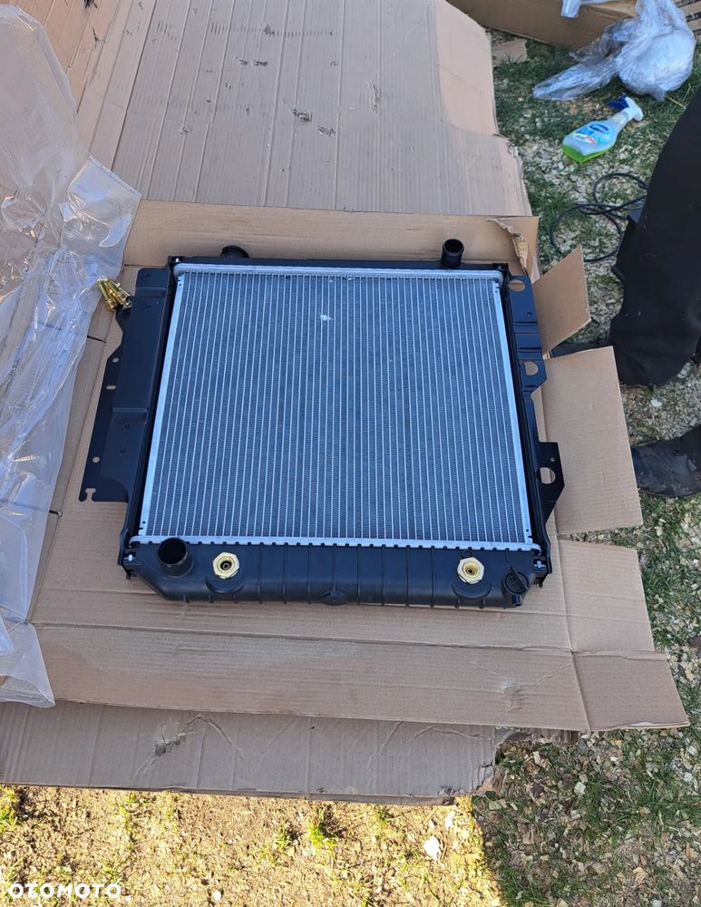 Chłodnica wody Jeep Wrangler YJ TJ 4.0 52040286 52007227 - 2