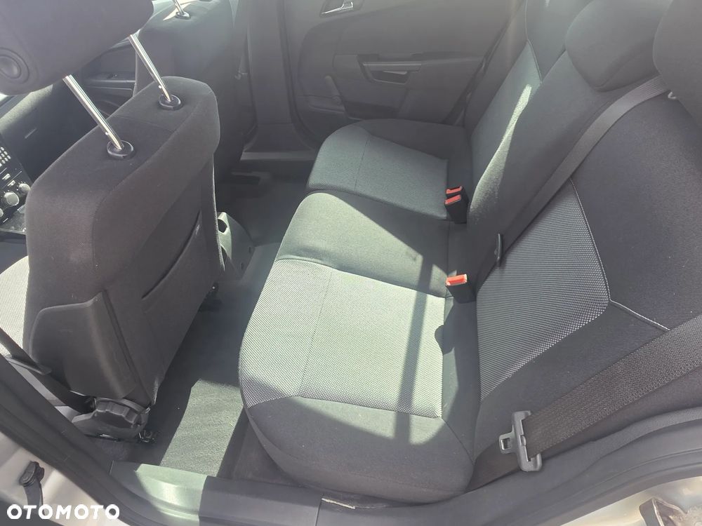 Opel Astra 1.8 - 13