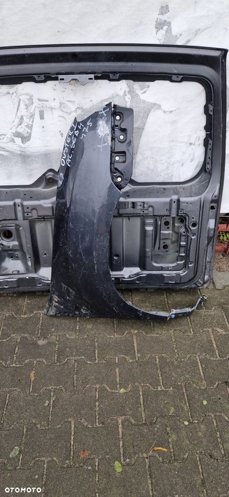 Błotnik Dacia Duster I 2010-2017r. Przód prawy - 1