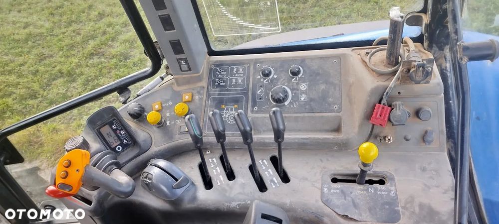 New Holland TM - 9