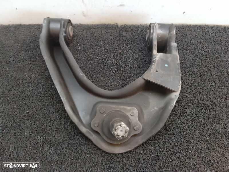 BRAÇO SUSPENSÃO SUPERIOR FRENTE DIREITO NISSAN NT400 CABSTAR - 1