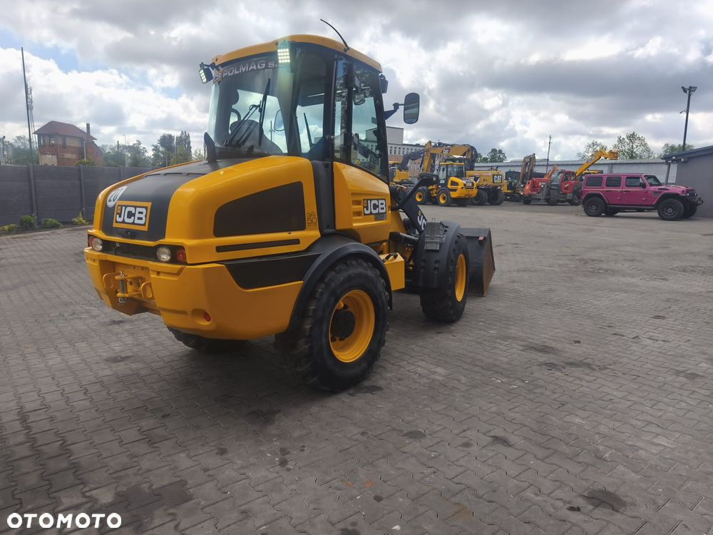 JCB 409 - 6