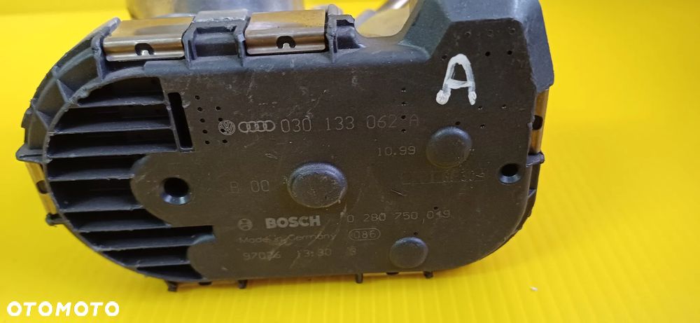 Przepustnica 1,4 VW Caddy , VW Polo, Seat Arosa 030133062A