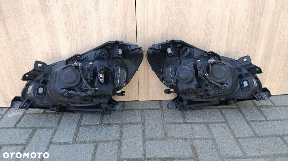 REFLEKTOR 2 LAMPY PRZÓD LEWA PRAWA EUROPA RENAULT CLIO III 3 8200261612 - 8