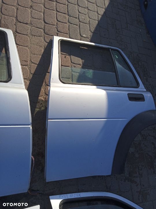 ZAMEK DRZWI LAND ROVER FREELANDER  PRAWE PRZEDNIE 97-06 - 4