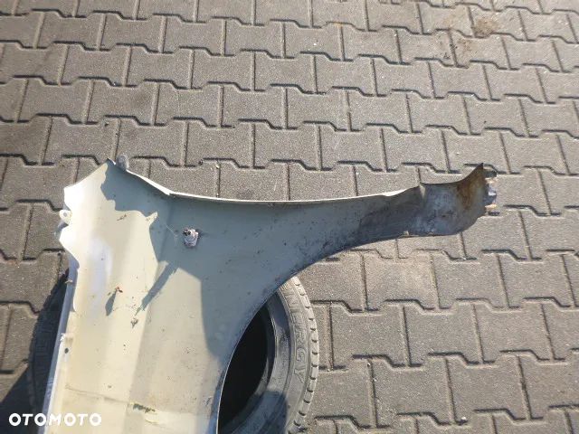 BŁOTNIK PRAWY PRZÓD PRAWY PRZEDNI CHEVROLET AVEO II T250 07-11 - 15