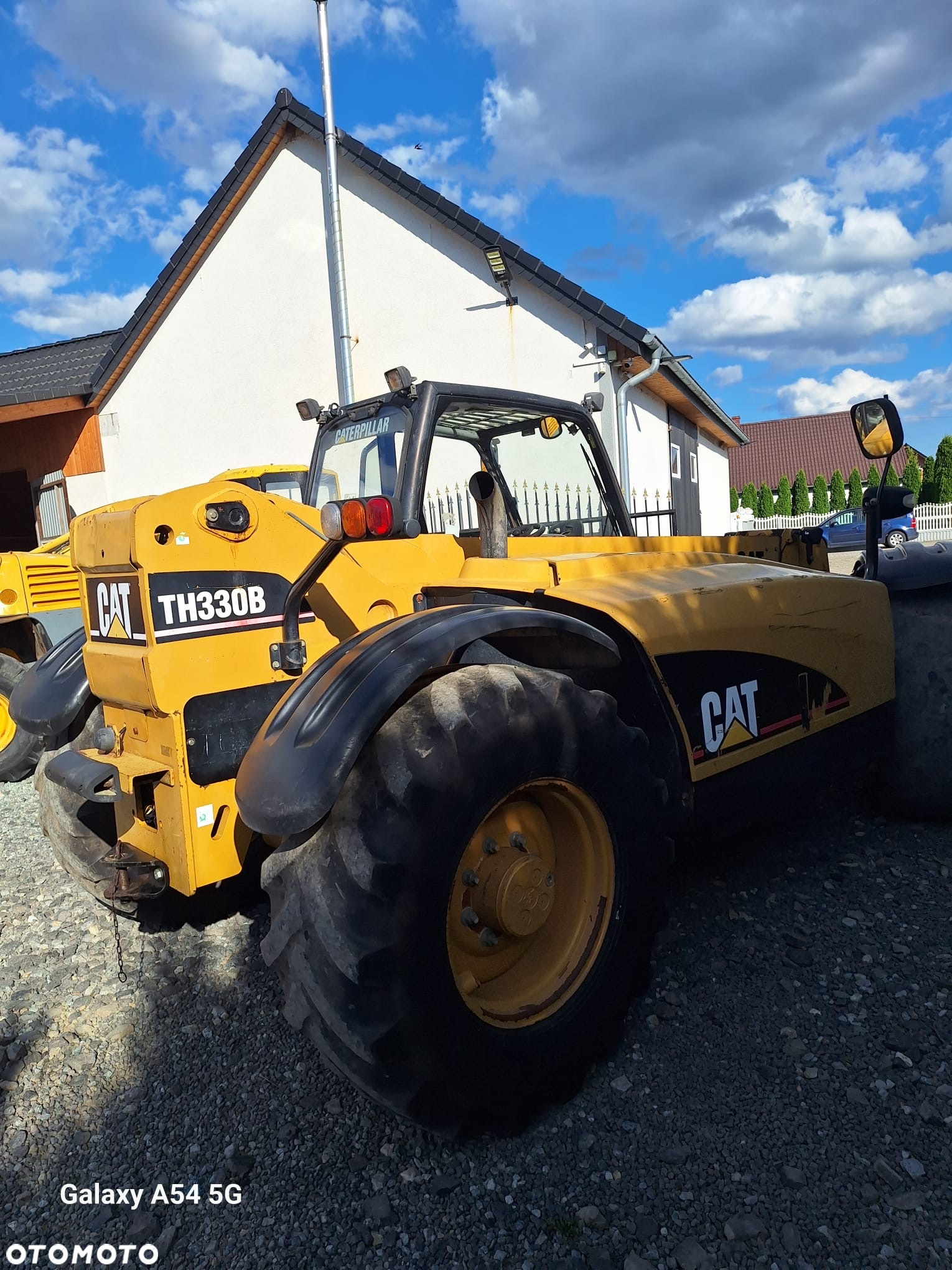 Caterpillar TH 330B - 6