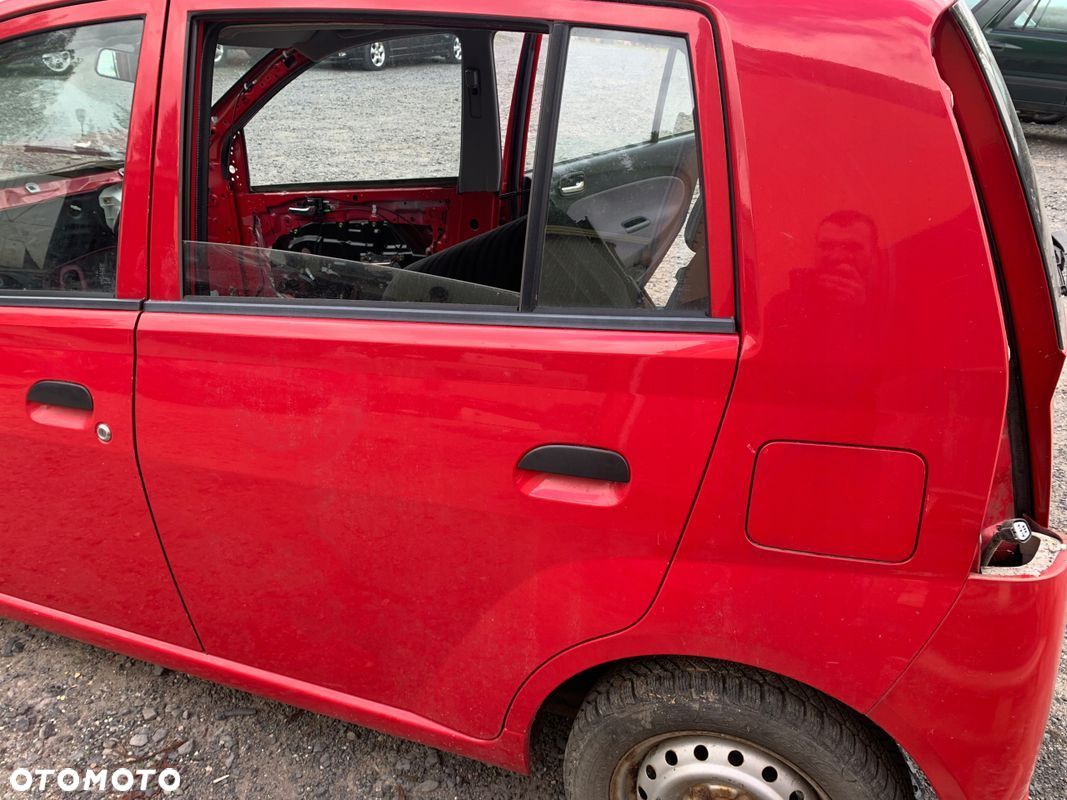 DAIHATSU CUORE VI 5D DRZWI LEWY TYŁ - 1