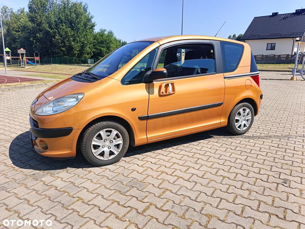 Peugeot 1007 1.4 Trendy - 26