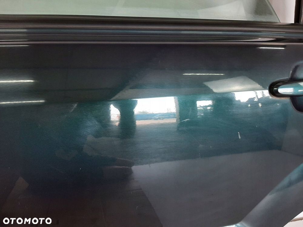 KIA SPORTAGE 2 II LIFT 09R DRZWI LEWY TYL KOD E2 - 12