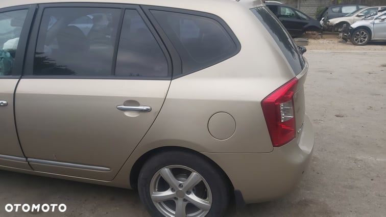 KIA CARENS III 2,0 crdi rozrusznik - 8