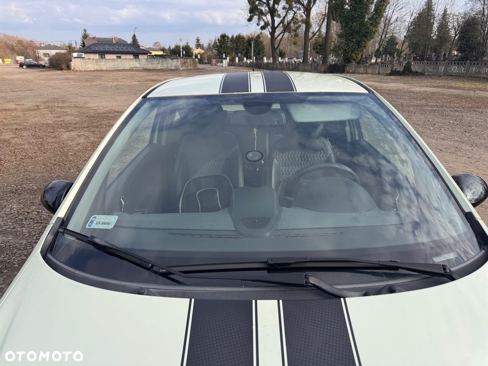 Opel Corsa 1.4 16V Cosmo - 11