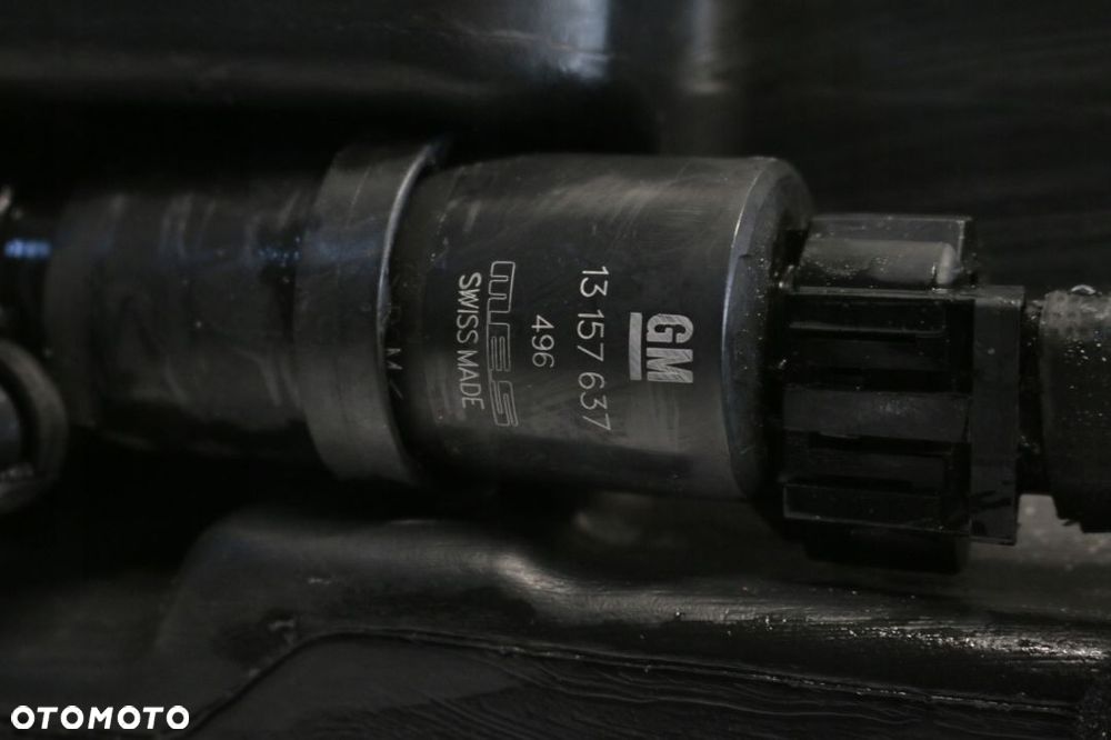 zbiornik spryskiwaczy xenon Opel Astra H - 4
