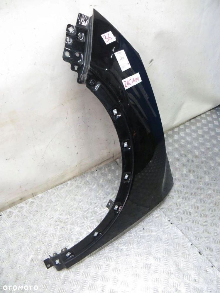 SSANGYONG TIVOLI BŁOTNIK LEWY PRZÓD LAK 14- - 2