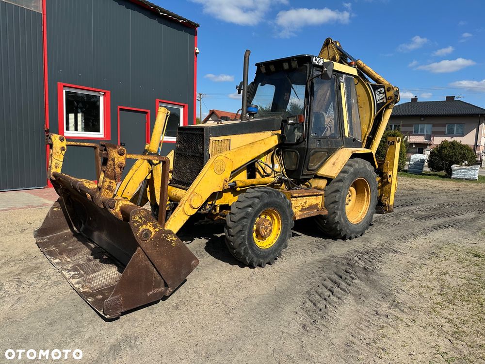 Caterpillar 428B ramię typu Banan - 14