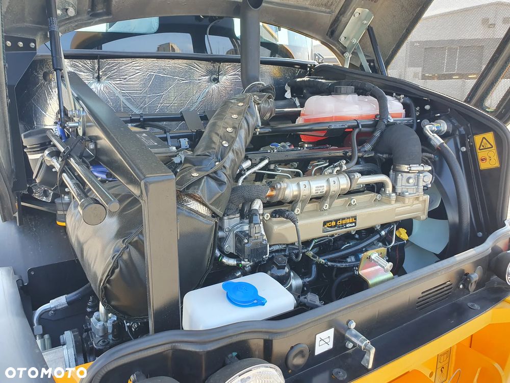JCB 409 - 17