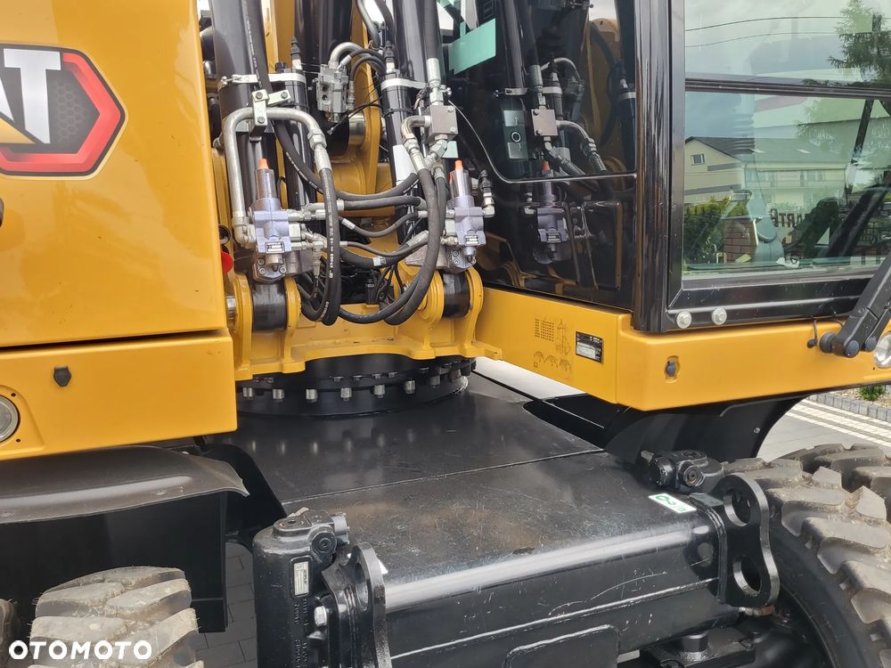 Caterpillar M316F / ROTOTILT ze szczypcami / sprowadzona / - 17
