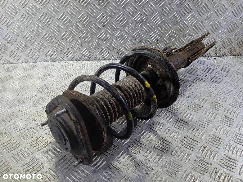 AMORTYZATOR PRAWY PRZEDNI SPRĘŻYNA TOYOTA AVENSIS T25 - 2