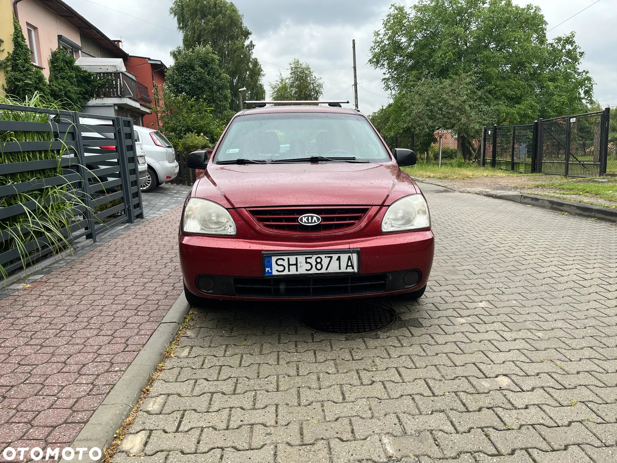 Kia Carens 2.0 CVVT LX - 12