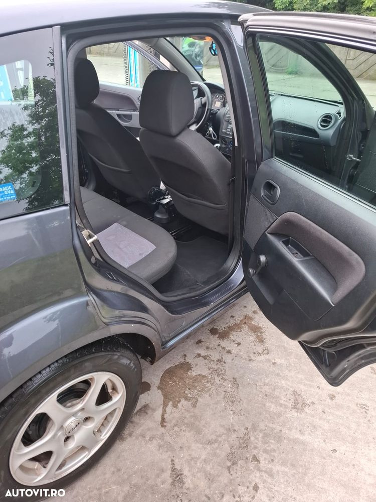 Ford Fiesta 1.4 TDCI Ghia - 8