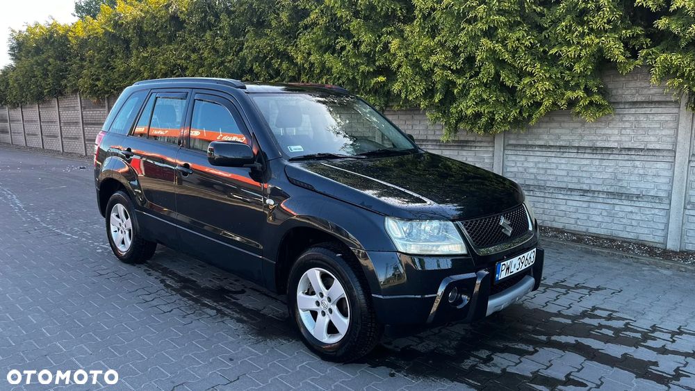 Suzuki Grand Vitara 2.0 Comfort + - 11