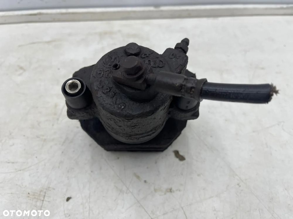 Zacisk hamulcowy VW Golf IV V VI Polo III IV Audi A3 8l 8p Leon I II Ibiza III IV Fabia I II III Octavia I II Caddy III 97-12r. prawy przedni jarzmo - 14