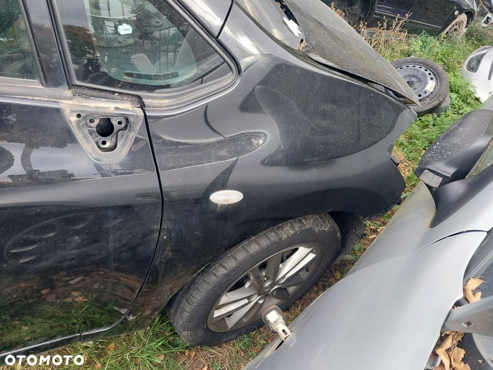 Błotnik prawy lewy toyota auris I kolor 209 - 1