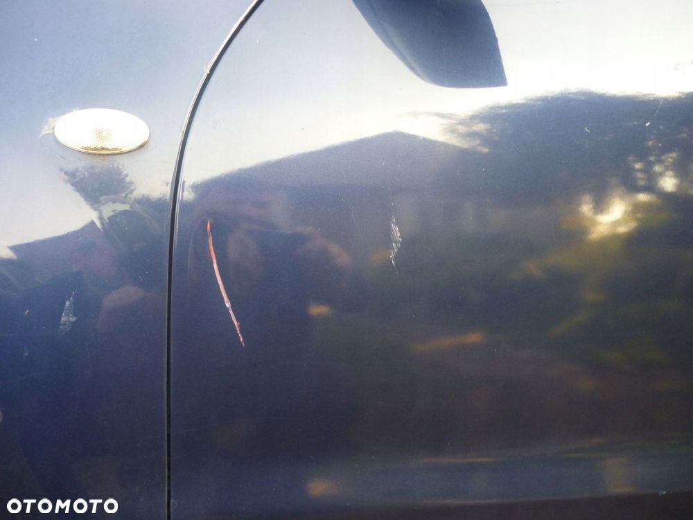 DRZWI LEWE PRZEDNIE SUZUKI GRAND VITARA II Z2U 06r. 5D - 2