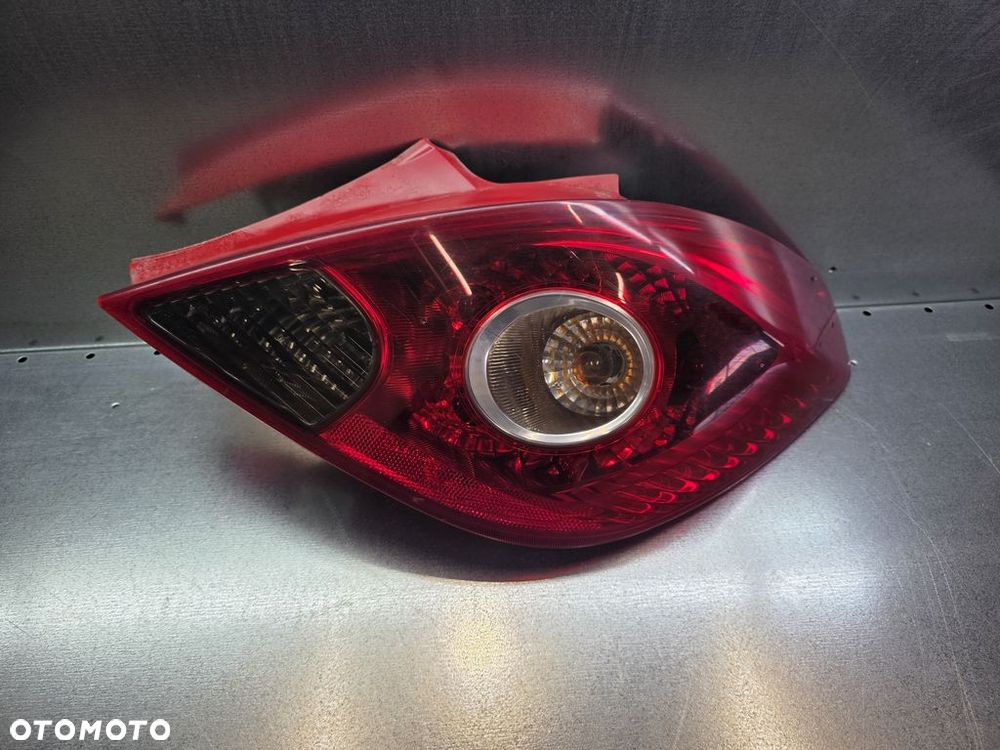 OPEL CORSA D 3D LAMPA TYŁ PRAWA 13186351 - 1