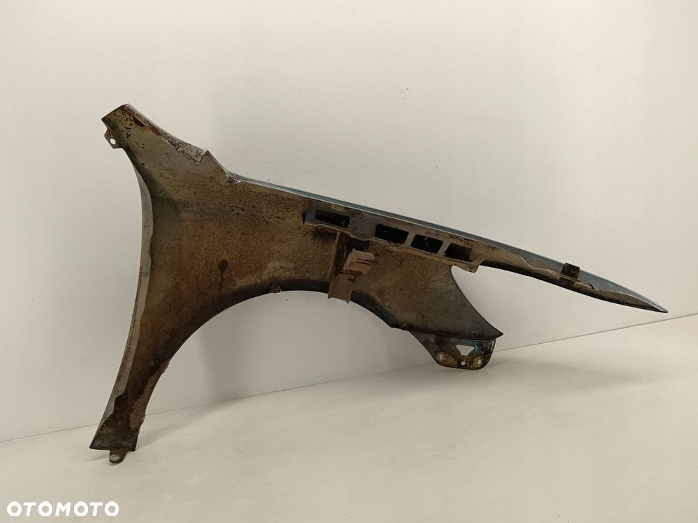 BŁOTNIK LEWY PRZEDNI PRZÓD SKODA OCTAVIA II LIFT 08-13 9151 - 6