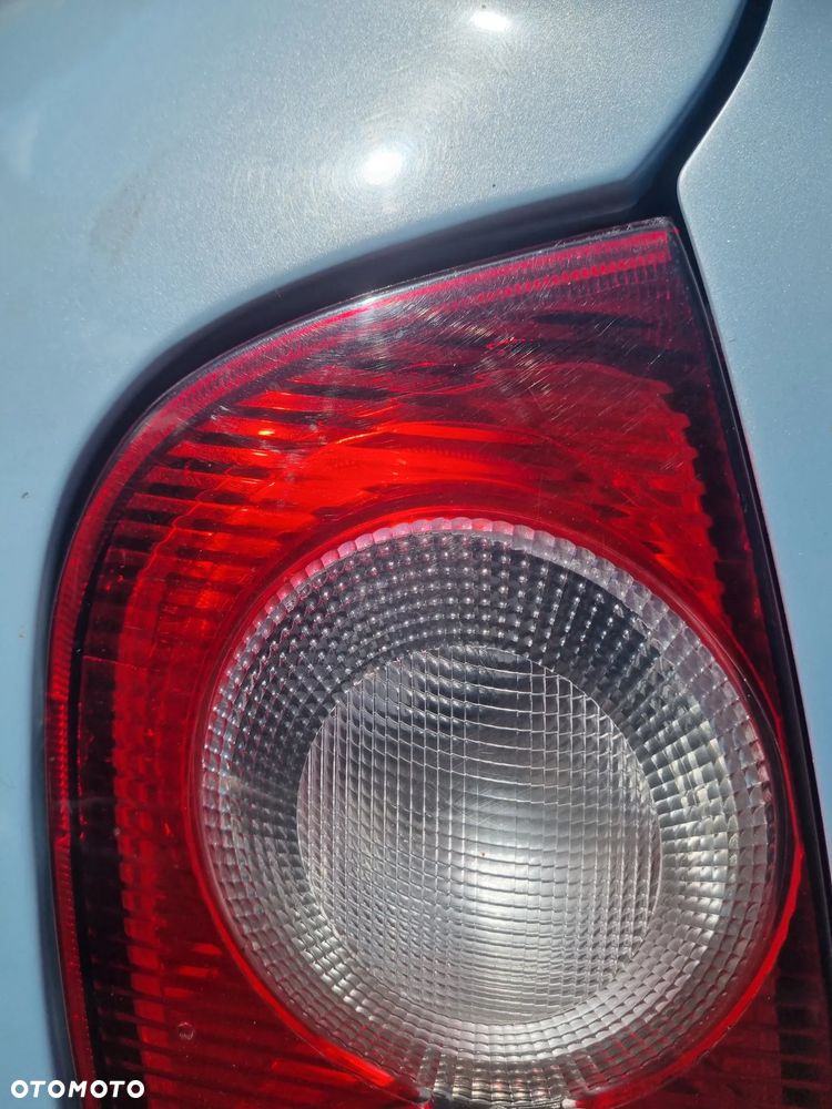 NISSAN MICRA III K12 03-07 2005 r. 5D HB lampa lewy tył lewa tylna LT EU * - 2