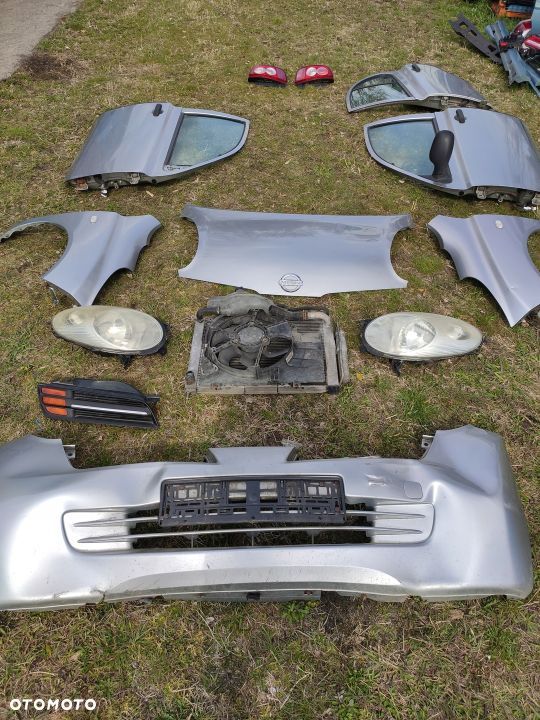 ZDERZAK PRZÓD PRZEDNI NISSAN MICRA K12 62090AX600 BIAŁY CZERWONY SREBRNY - 1